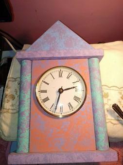 CLOCK OF WOOD PINK AND PURPLE AND BLUE  IN COLOR FOR THE WAL