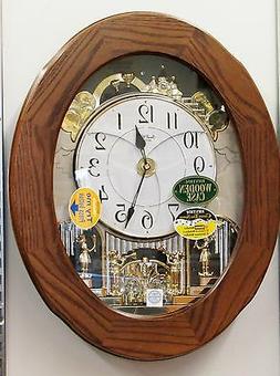 "RHYTHM" MUSICAL WALL CLOCK -"JOYFUL ESSENCE " IN  OAK 4MH41